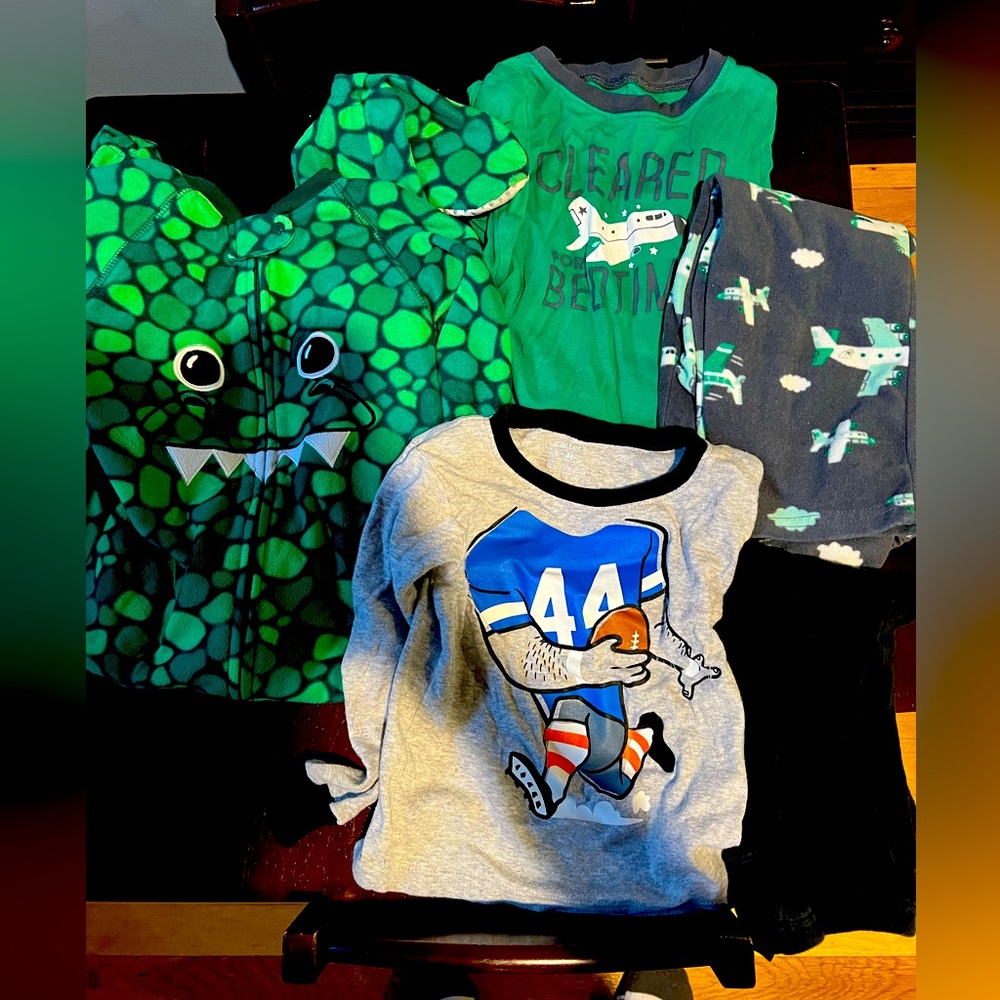 Three pairs of winter pajamas. Two separate’s & one with feet.  4t long sleeve
